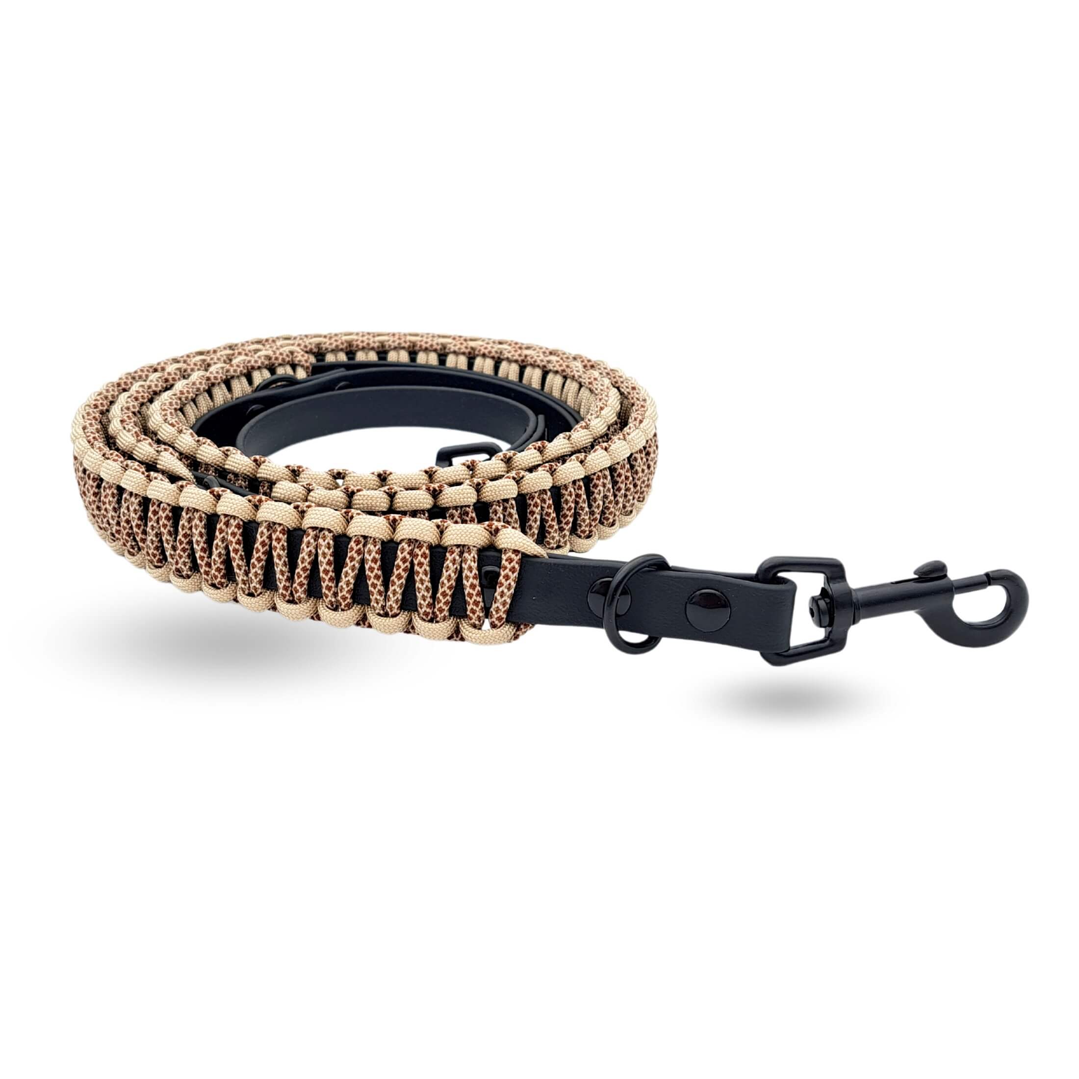 Hundeleine Ghepardo in schwarz-beige aus BioThane mit Paracord Seilen verkleidet